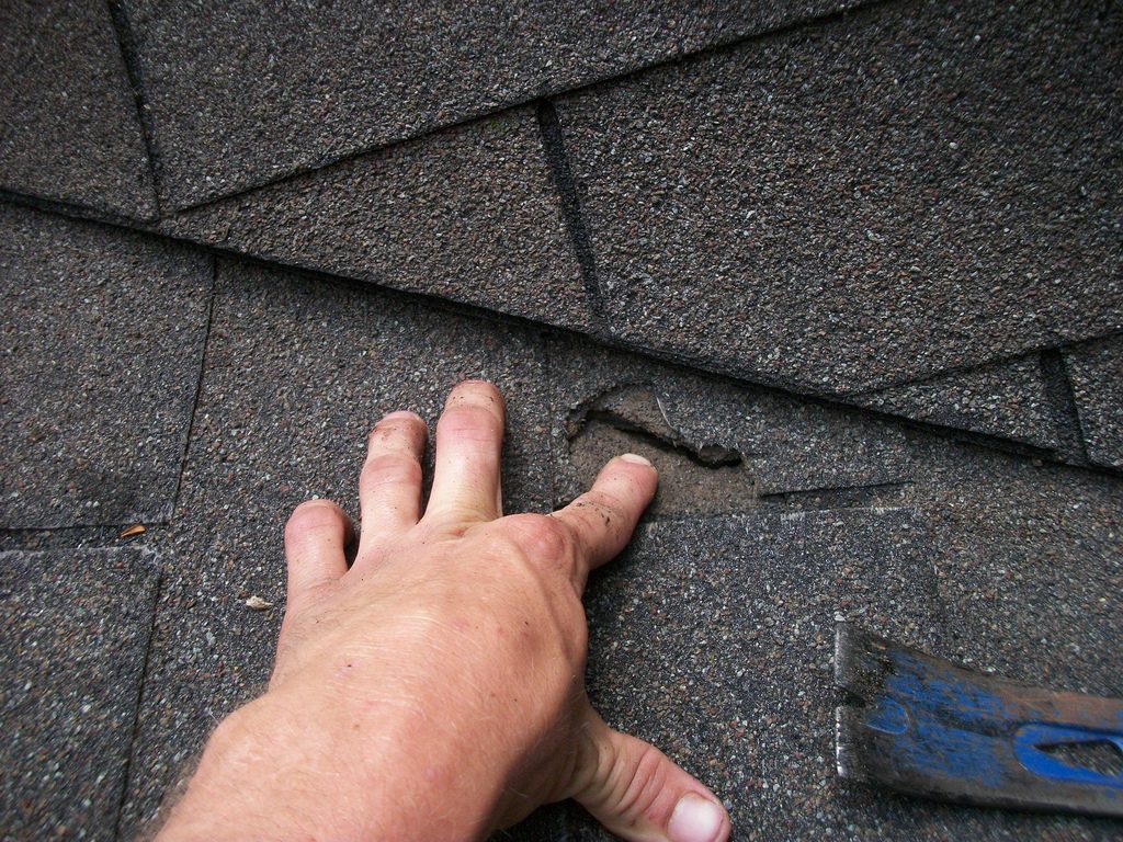 roof repair vs replacement huntersville nc
